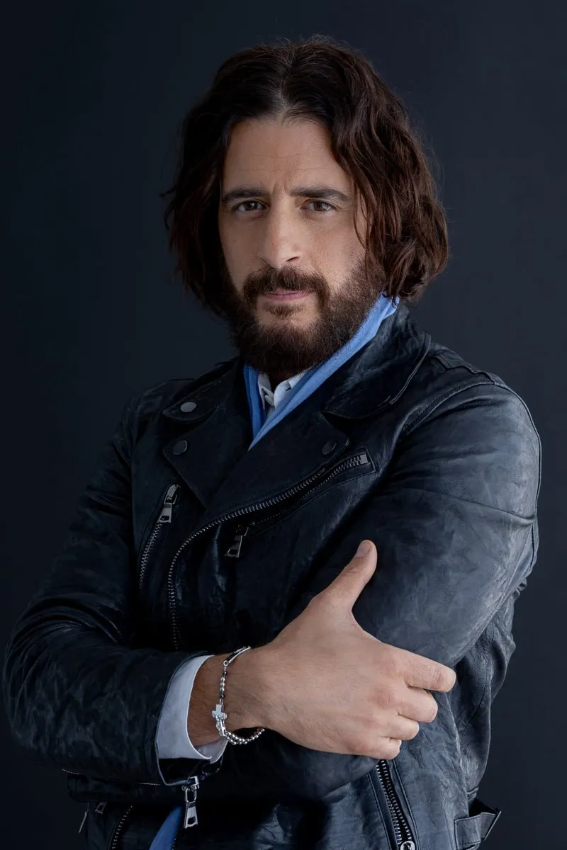 Jonathan Roumie wearing a rosary bracelet
